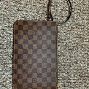 Louis Vuitton small purse.